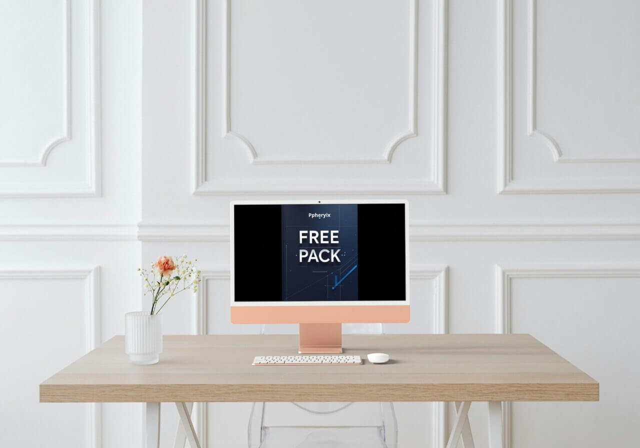 Computer monitor with "Free Pack" on a desk with a white wall background