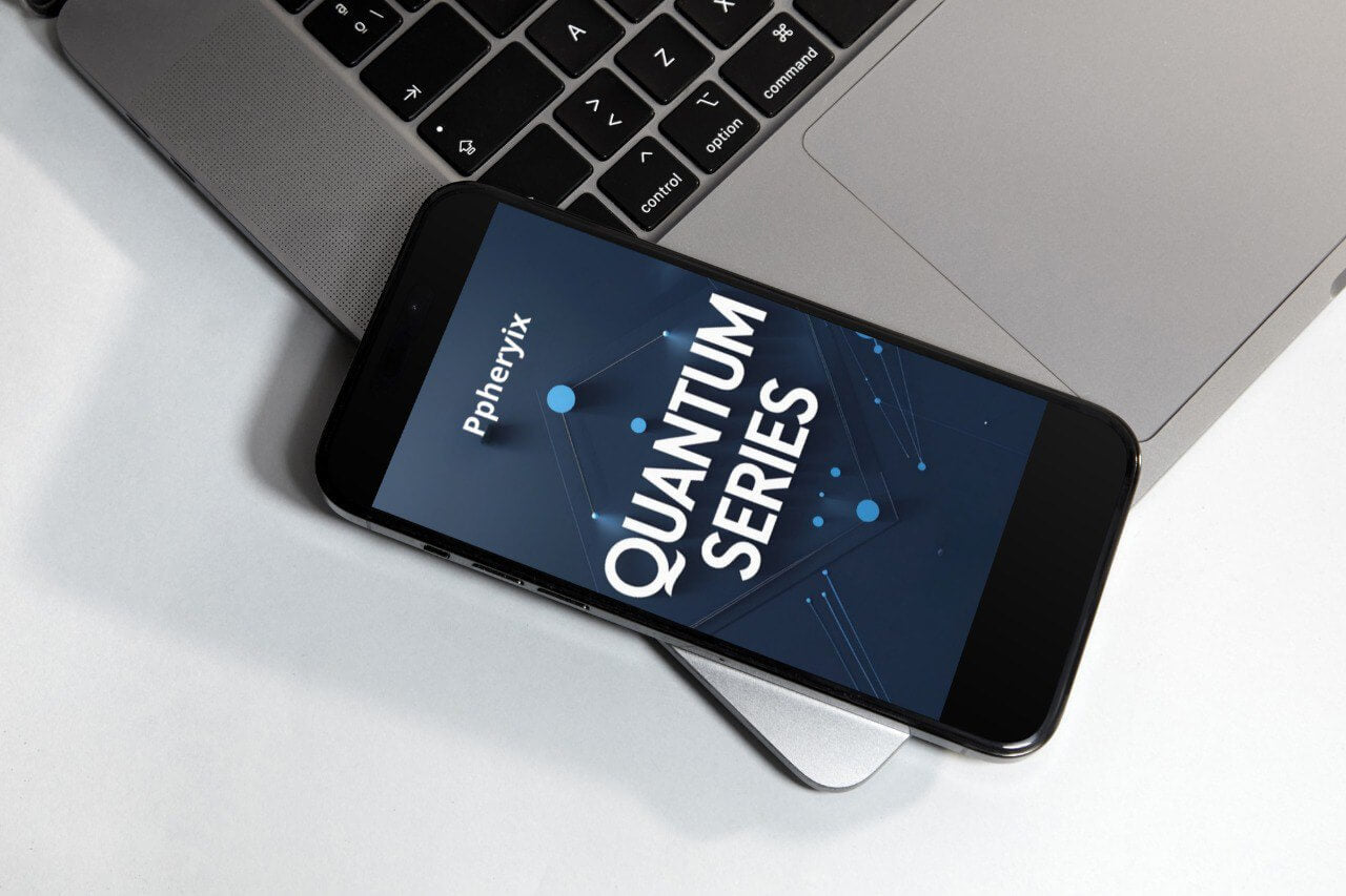 Smartphone displaying 'Pherex Quantum Series' on a laptop keyboard